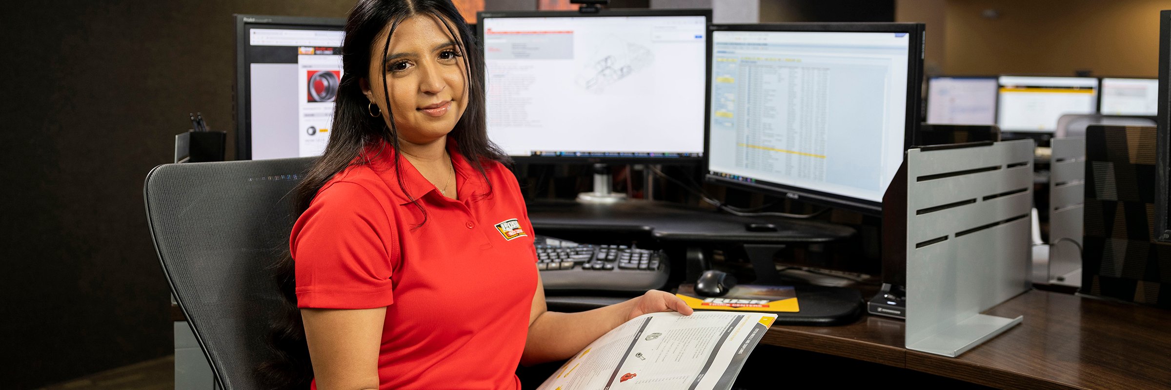 RushCare call center employee holding Parts Catalog