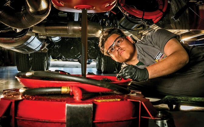 Rush Truck Centers technician inspection underside of truck