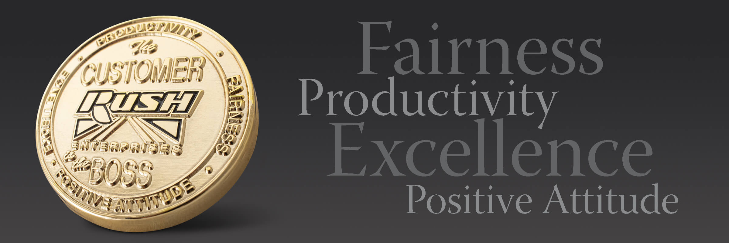 Rush Enterprises coin with the words Fairness, Productivity, Excellence and Positive Attitude to the right