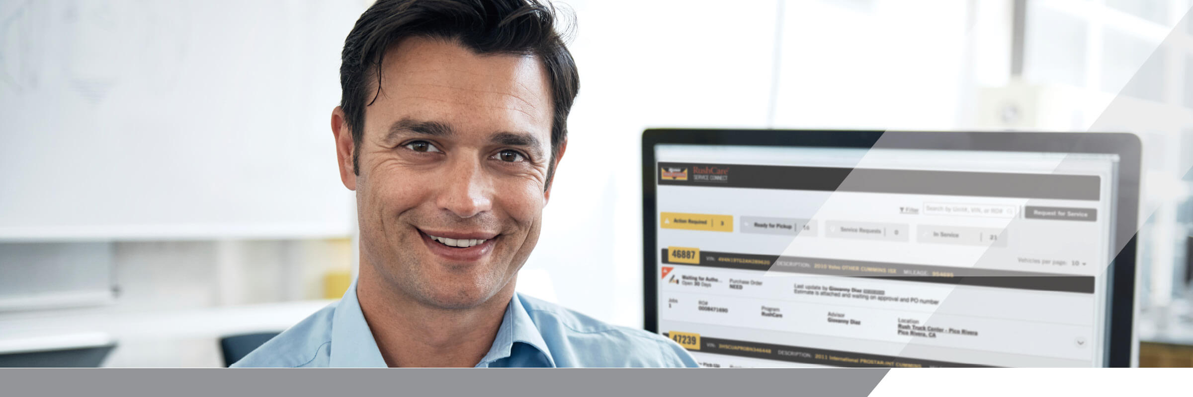 man sitting in front of computer that shows Service Connect dashboard