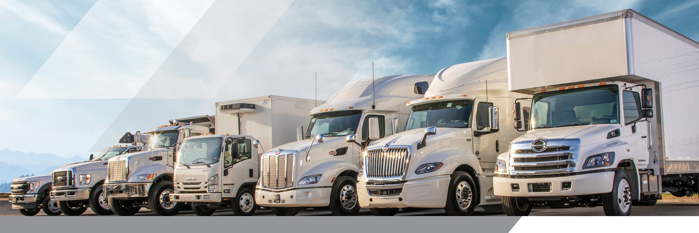 Lineup of Peterbilt, International, Ford, Isuzu and Hino trucks | New Trucks | Used Trucks | Semi Trucks | Commercial Trucks