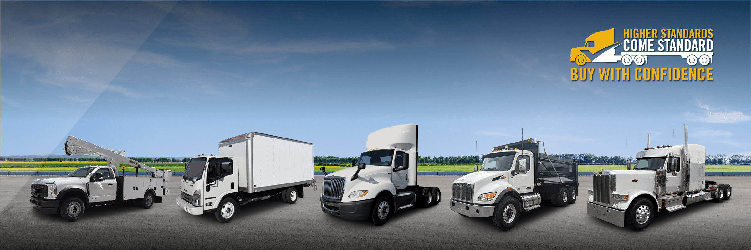 Line up of used trucks in parking lot | Higher Standards Come Standard. Buy With Confidence.