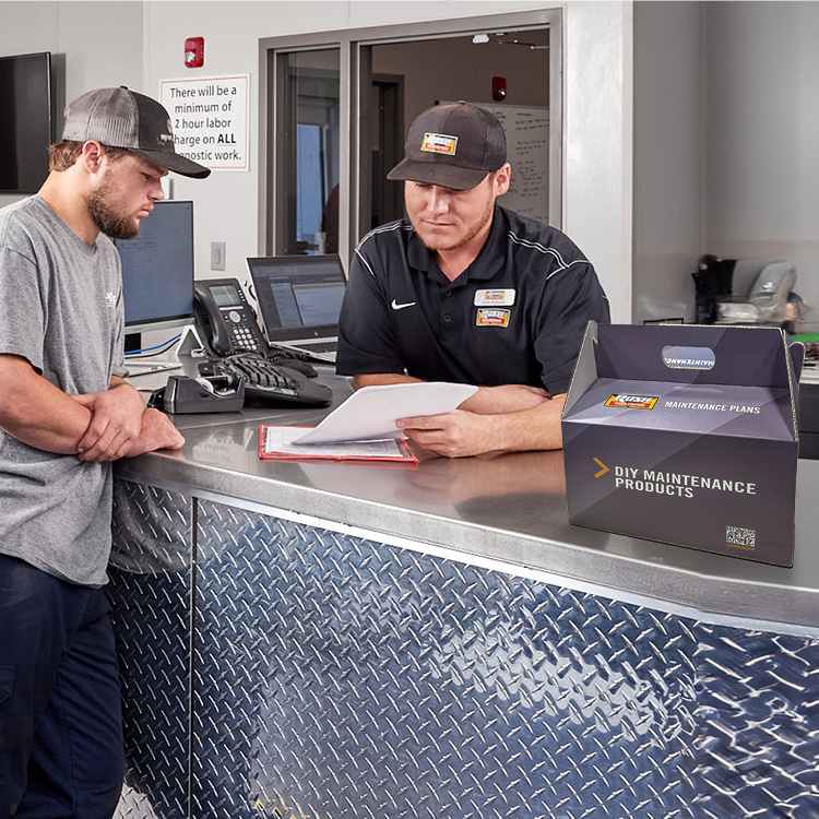 Rush Truck Centers employee talking to customer at parts counter